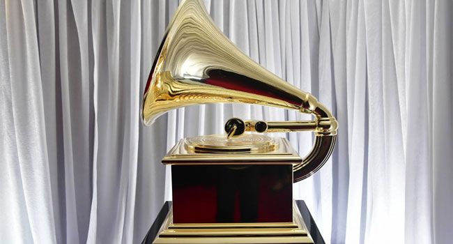 A large Grammy award is seen outside the press room during the 62nd Annual Grammy Awards on January 26, 2020, in Los Angeles. (Photo by Frederic J. BROWN / AFP)