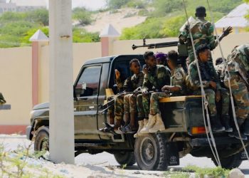 FILE - Somali soldiers are seen riding on a pickup truck in Mogadishu, Somalia, April 27, 2022.