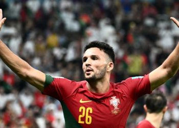 Portugal’s forward #26 Goncalo Ramos celebrates after scoring his team’s fifth goal, his hat-trick, during the Qatar 2022 World Cup round of 16 football match between Portugal and Switzerland at Lusail Stadium in Lusail, north of Doha on December 6, 2022. (Photo by Jewel SAMAD / AFP)