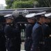 The coffin of the late Brazilian football star Pele is transported to the Santos’ Memorial Cemetery after the funeral procession in Santos, Sao Paulo state, Brazil on January 3, 2023. – Brazilian football legend Pele’s remains arrived Tuesday at the cemetery where he will be interred in a mausoleum, after three days of national mourning, a 24-hour wake and a massive funeral procession. Pele’s casket, draped in the Brazilian flag and that of his longtime club, Santos FC, arrived atop a red firetruck at the Santos Memorial Cemetery, near the stadium where “The King” began his rise to become what many consider the greatest footballer of all time. (Photo by CAIO GUATELLI / AFP)