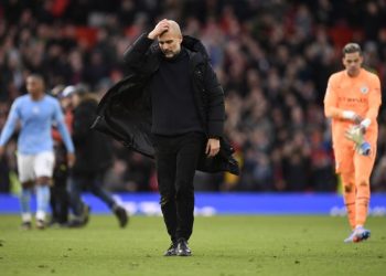 Manchester City’s Spanish manager Pep Guardiola reacts after the English Premier League football match between Manchester United and Manchester City at Old Trafford in Manchester, north west England, on January 14, 2023. (Photo by Oli SCARFF / AFP) /