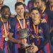 (From L) Barcelona’s French forward Ousmane Dembele, Barcelona’s Polish forward Robert Lewandowski and Barcelona’s Spanish midfielder Gavi pose for pictures with the trophy after winning the Spanish Super Cup final football match between Real Madrid CF and FC Barcelona at the King Fahd International Stadium in Riyadh, Saudi Arabia, on January 15, 2023. (Photo by Giuseppe CACACE / AFP)