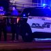 Police patrol the scene along Garvey Avenue in Monterey Park, California, on January 21, 2023, where police are responding to reports of multiple people shot. (Photo by Frederic J. BROWN / AFP)