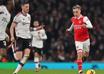 Arsenal’s Belgian midfielder Leandro Trossard (R) runs with the ball during the English Premier League football match between Arsenal and Manchester United at the Emirates Stadium in London on January 22, 2023. (Photo by Glyn KIRK / AFP) / RESTRICTED TO EDITORIAL USE. NO USE WITH UNAUTHORIZED AUDIO, VIDEO, DATA, FIXTURE LISTS, CLUB/LEAGUE LOGOS OR ‘LIVE’ SERVICES. ONLINE IN-MATCH USE LIMITED TO 120 IMAGES. AN ADDITIONAL 40 IMAGES MAY BE USED IN EXTRA TIME. NO VIDEO EMULATION. SOCIAL MEDIA IN-MATCH USE LIMITED TO 120 IMAGES. AN ADDITIONAL 40 IMAGES MAY BE USED IN EXTRA TIME. NO USE IN BETTING PUBLICATIONS, GAMES OR SINGLE CLUB/LEAGUE/PLAYER PUBLICATIONS. – RESTRICTED TO EDITORIAL USE. No use with unauthorized audio, video, data, fixture lists, club/league logos or ‘live’ services. Online in-match use limited to 120 images. An additional 40 images may be used in extra time. No video emulation. Social media in-match use limited to 120 images. An additional 40 images may be used in extra time. No use in betting publications, games or single club/league/player publications. /