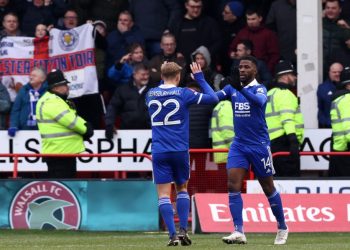 Leicester City’s Nigerian striker Kelechi Iheanacho (R) celebrates scoring the opening goal during the English FA Cup fourth round football match between Walsall and Leicester City at the Poundland Bescot Stadium in Walsall, on January 28, 2023. (Photo by DARREN STAPLES / AFP)