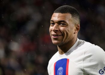 Paris Saint-Germain’s French forward Kylian Mbappe reacts during the French L1 football match between Stade Rennais FC and Paris Saint-Germain (PSG) at the Roazhon Park stadium in Rennes, western France, on January 15, 2023. (Photo by LOIC VENANCE / AFP)