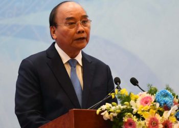 (FILES) In this file photo taken on October 21, 2022 Vietnam’s President Nguyen Xuan Phuc speaks at a ceremony commemorating the 45th anniversary of Vietnam’s accession to the United Nations in Hanoi’s international convention centre. – Vietnam’s President Nguyen Xuan Phuc has resigned, state media reported January 17, 2023. (Photo by Nhac NGUYEN / AFP)