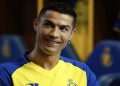 Portugal’s forward Cristiano Ronaldo poses with Al-Nassr’s number seven jersey in Madrid on December 30, 2022 upon signing for the Saudi Arabian club.