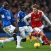 Arsenal’s Norwegian midfielder Martin Odegaard (R) challenges Everton’s Senegalese-born Belgian midfielder Amadou Onana (L) and Everton’s Senegalese midfielder Idrissa Gueye during the English Premier League football match between Everton and Arsenal at Goodison Park in Liverpool, north-west England, on February 4, 2023. (Photo by Paul ELLIS / AFP)