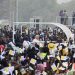 Pope Francis (C) waves as he arrives by popemobile for the holy mass at the John Garang Mausoleum in Juba, South Sudan, on February 5, 2023. – Pope Francis wraps up his pilgrimage to South Sudan with an open-air mass on February 5, 2023 after urging its leaders to focus on bringing peace to the fragile country torn apart by violence and poverty.The three-day trip is the first papal visit to the largely Christian country since it achieved independence from Sudan in 2011 and plunged into a civil war that killed nearly 400,000 people. (Photo by Tiziana FABI / AFP)