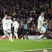 Manchester United’s English striker Jadon Sancho (2nd L) shoots and scores his team second goal during the English Premier League football match between Manchester United and Leeds United at Old Trafford in Manchester, north west England, on February 8, 2023. (Photo by Oli SCARFF / AFP)