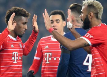 Bayern Munich’s French forward Kingsley Coman (L) celebrates scoring his team’s first goal during first leg of the UEFA Champions League round of 16 football match between Paris Saint-Germain (PSG) and FC Bayern Munich at the Parc des Princes stadium in Paris on February 14, 2023. (Photo by FRANCK FIFE / AFP)