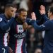 Paris Saint-Germain’s French forward Kylian Mbappe (L), Paris Saint-Germain’s Brazilian forward Neymar (C) and Paris Saint-Germain’s Argentine forward Lionel Messi (R) react after scoring a goal during the French L1 football match between Paris Saint-Germain (PSG) and Lille LOSC at The Parc des Princes Stadium in Paris on February 19, 2023. (Photo by FRANCK FIFE / AFP)