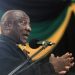 South Africa President Cyril Ramaphosa addresses delegates at the Olive Convention Centre in Durban, on July 24, 2022. – The 9th annual Kwazlu-Natal Provincial conference elected pro Zuma leaders, which is seen as a setback for South African President Cyril Ramaphosa. Protesters sang and chanted slogans calling for the resignation of the South African President Cyril Ramaphosa who is due to address the 1,700 delegates at the closing of the conference. (Photo by Rajesh JANTILAL / AFP)