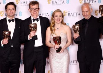 Graham Broadbent, Pete Czernin, and Martin Mcdonagh pose with their awards for Outstanding British Film for “The Banshees Of Inisherin” alongside Kerry Condon posing with her Best Supporting Actress award during the 2023 British Academy of Film and Television Arts (BAFTA) Film Awards at the Royal Festival Hall in London, Britain, February 19, 2023. REUTERS/Henry Nicholls