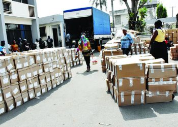 Some INEC officials sorting out materials for distribution to Area Councils ahead of rescheduled 2019 presidential and National Assembly elections on Thursday (21/2/19).01556/21/2/19/Albert Otu/Precious Imonigie/BJO/NAN