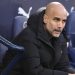 Manchester City’s Spanish manager Pep Guardiola reacts prior to the English Premier League football match. (Photo by Oli SCARFF / AFP)