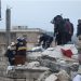 Rescuers search for survivors under the rubble of a damaged building, following an earthquake, in rebel-held Azaz, Syria February 6, 2023. REUTERS/Mahmoud Hassano