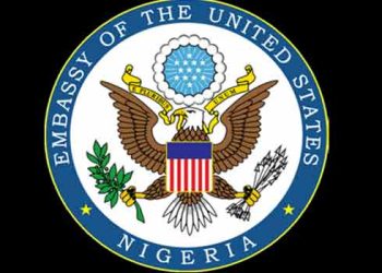 A logo of US Embassy