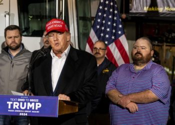 EAST PALESTINE, OH – FEBRUARY 22: Former President Donald Trump stands next to a pallet of water before delivering remarks at the East Palestine Fire Department station on February 22, 2023 in East Palestine, Ohio. On February 3rd, a Norfolk Southern Railways train carrying toxic chemicals derailed causing an environmental disaster. Thousands of residents were ordered to evacuate after the area was placed under a state of emergency and temporary evacuation orders. Michael Swensen/Getty Images/AFP (Photo by Michael Swensen / GETTY IMAGES NORTH AMERICA / Getty Images via AFP)