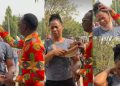 #Nigeria Decides: Moment pastor Paul Enenche healed lady with a broken neck at his Polling Unit (Video)