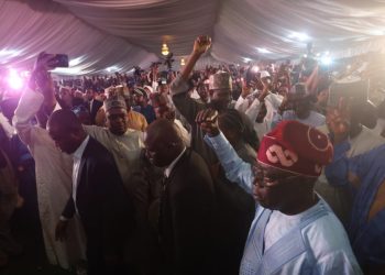 Ruling party candidate Bola Tinubu, acknowledges supporters in Abuja on March 1, 2023 during celebrations at his campaign headquarters.(Photo by Kola SULAIMON / AFP)