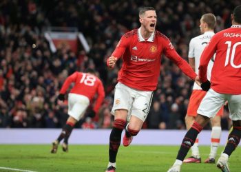 Manchester United’s Dutch striker Wout Weghorst celebrates after scoring his team first goal during the English FA Cup fifth round football match between Manchester United and West Ham at Old Trafford in Manchester, north west England, on March 1, 2023. (Photo by Lindsey Parnaby / AFP)