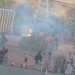 This screen grab taken from a video provided by the Atlanta Police Department shows protesters throwing bricks at a construction site in Atlanta on March 5, 2023. – Atlanta police said at least 35 people were arrested after a protest against a new police training facility nicknamed “Cop City” by opponents, turned violent, with assailants throwing Molotov cocktails and bricks at officers. (Photo by HANDOUT and City of Atlanta Police Department / AFP)