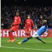 Napoli’s Nigerian forward Victor Osimhen (C) scores his side’s second goal past Frankfurt’s German goalkeeper Kevin Trapp (L) during the UEFA Champions League round of 16, second leg football match between SSC Napoli and Eintracht Frankfurt at the Diego-Maradona stadium in Naples on March 15, 2023. (Photo by Tiziana FABI / AFP)