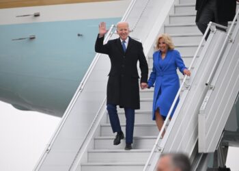 US President Joe Biden and First Lady Jill Biden step off Air Force One upon arrival at Ottawa International Airport in Ottawa, Canada on March 23, 2023. (Photo by Mandel NGAN / AFP)