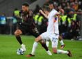 Germany’s midfielder Felix Nmecha (L) and Belgium’s defender Timothy Castagne vie for the ball during the international friendly football match Germany v Belgium in Cologne, western Germany, on March 28, 2023. (Photo by UWE KRAFT / AFP)