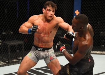 [FILE] Israel Adesanya avoids a punch from Paulo Costa during their UFC middleweight championship bout at UFC 253 on September 27, 2020 in Abu Dhabi, United Arab Emirates. (Photo by Josh Hedges/Zuffa LLC)