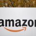 (FILES) In this file photo taken on November 27, 2019 an Amazon sign is pictured at the Amazon Fulfilment Centre in Peterborough, east England. - US e-commerce giant Amazon on Friday said it will create another 10,000 jobs in Britain, a day after announcing a US hiring spree as online shopping booms during the pandemic. (Photo by DANIEL LEAL-OLIVAS / AFP)