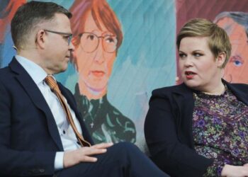 National Coalition Party leader Petteri Orpo (L) and Chair of the Center party Annika Saarikko are pictured in the central Sanomatalo building in Helsinki, Finland, on March 28, 2023 during a political debate with the main party leaders few days before the Finnish Parliamentary elections. – Finns vote on April 2, 2023 in a nail-bitingly close general election that sees Prime Minister Sanna Marin’s Social Democrats trailing two right-wing parties vying for her post. (Photo by Alessandro RAMPAZZO / AFP)