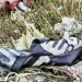 A discarded Islamic State flag lies torn on the ground (Giuseppe Cacace/AFP/Getty Images)