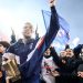 Paris Saint-Germain’s French forward Kylian Mbappe cheer supporters at the end of a ceremony after he became Paris Saint-Germain’s all-time top scorer with his 201st goal for the club in their 4-2 win in the French L1 football match against FC Nantes at The Parc des Princes Stadium in Paris on March 4, 2023. (Photo by FRANCK FIFE / POOL / AFP)