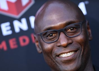 (FILES) In this file photo taken on August 20, 2019, US actor Lance Reddick arrives for the Los Angeles premiere of "Angel Has Fallen" at the Regency Village theatre in Westwood, California. - Actor Lance Reddick who played steely Baltimore police lieutenant Cedric Daniels in hit TV show "The Wire" has died, his publicist said Friday. He was 60. Reddick, who also appeared in the "John Wick" series of films opposite Keanu Reeves, was found dead at his home in the Studio City area of Los Angeles, trade title TMZ reported. (Photo by VALERIE MACON / AFP)