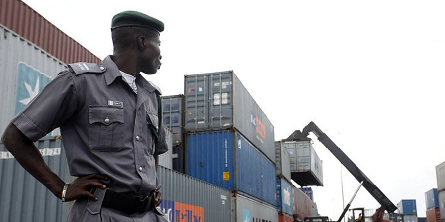 Customs intercept trailer of rice, arrest 18 suspects