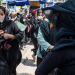 In this file photo, Taliban fighters fire in air to disperse Afghan women protesters in Kabul on August 13, 2022. (Photo by Wakil KOHSAR / AFP)