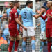 Players shake hands on the pitch after the English Premier League football match between Manchester City and Liverpool at the Etihad Stadium in Manchester, north west England, on April 1, 2023. - Manchester City won the game 4-1. (Photo by Paul ELLIS / AFP) / RESTRICTED TO EDITORIAL USE. NO USE WITH UNAUTHORIZED AUDIO, VIDEO, DATA, FIXTURE LISTS, CLUB/LEAGUE LOGOS OR 'LIVE' SERVICES. ONLINE IN-MATCH USE LIMITED TO 120 IMAGES. AN ADDITIONAL 40 IMAGES MAY BE USED IN EXTRA TIME. NO VIDEO EMULATION. SOCIAL MEDIA IN-MATCH USE LIMITED TO 120 IMAGES. AN ADDITIONAL 40 IMAGES MAY BE USED IN EXTRA TIME. NO USE IN BETTING PUBLICATIONS, GAMES OR SINGLE CLUB/LEAGUE/PLAYER PUBLICATIONS. - RESTRICTED TO EDITORIAL USE. No use with unauthorized audio, video, data, fixture lists, club/league logos or 'live' services. Online in-match use limited to 120 images. An additional 40 images may be used in extra time. No video emulation. Social media in-match use limited to 120 images. An additional 40 images may be used in extra time. No use in betting publications, games or single club/league/player publications. /