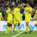 Villarreal’s Nigerian midfielder Samuel Chukwueze (L) celebrates scoring his team’s third goal during the Spanish league football match between Real Madrid CF and Villarreal CF at the Santiago Bernabeu stadium in Madrid on April 8, 2023. (Photo by Pierre-Philippe MARCOU / AFP)