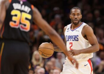 PHOENIX, ARIZONA – APRIL 16: Kawhi Leonard #2 of the LA Clippers handles the ball during the first half Game. One of the Western Conference First Round Playoffs against the Phoenix Suns at Footprint Center on April 16, 2023 in Phoenix, Arizona. (Photo by Christian Petersen/Getty Images)