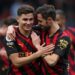 Manchester City's Argentinian striker Julian Alvarez (L) and Manchester City's Portuguese midfielder Bernardo Silva (R) celebrate on the pitch after the English Premier League football match between Fulham and Manchester City at Craven Cottage in London on April 30, 2023. - Man City won the game 2-1. (Photo by Adrian DENNIS / AFP) / RESTRICTED TO EDITORIAL USE. NO USE WITH UNAUTHORIZED AUDIO, VIDEO, DATA, FIXTURE LISTS, CLUB/LEAGUE LOGOS OR 'LIVE' SERVICES. ONLINE IN-MATCH USE LIMITED TO 120 IMAGES. AN ADDITIONAL 40 IMAGES MAY BE USED IN EXTRA TIME. NO VIDEO EMULATION. SOCIAL MEDIA IN-MATCH USE LIMITED TO 120 IMAGES. AN ADDITIONAL 40 IMAGES MAY BE USED IN EXTRA TIME. NO USE IN BETTING PUBLICATIONS, GAMES OR SINGLE CLUB/LEAGUE/PLAYER PUBLICATIONS. - RESTRICTED TO EDITORIAL USE. No use with unauthorized audio, video, data, fixture lists, club/league logos or 'live' services. Online in-match use limited to 120 images. An additional 40 images may be used in extra time. No video emulation. Social media in-match use limited to 120 images. An additional 40 images may be used in extra time. No use in betting publications, games or single club/league/player publications. /