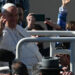 Pope Francis waves as he arrives to celebrate a holy mass at Kossuth Lajos’ Square during his visit in Budapest on April 30, 2023, the last day of his tree-day trip to Hungary. (Photo by Vincenzo PINTO / AFP)