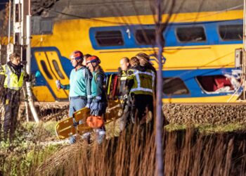 Rescue workers at the scene in The Netherlands. Pic: Kyrlian De Bot/Reuters