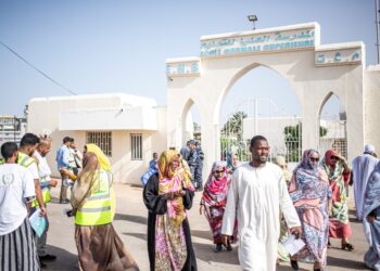 Voters enter a polling station in Nouakchott on May 13, 2023. – Voters in the West African nation of Mauritania began casting ballots on May 13, 2023 in the first legislative and local elections since President Mohamed Ould Ghazouani came to power in 2019. (Photo by MED LEMINE RAJEL / AFP)