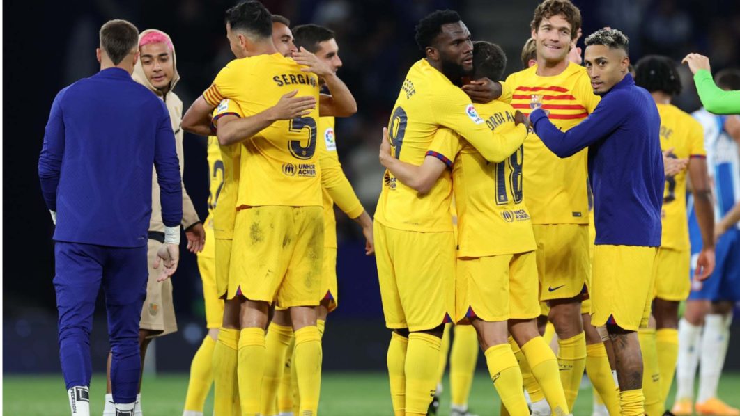 Barcelona earn La Liga title with Espanyol rout