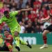 Manchester United’s French striker Anthony Martial (C) challenges Bournemouth’s English defender Lloyd Kelly (L) and Bournemouth’s Scottish midfielder Ryan Christie (R) during the English Premier League football match between Bournemouth and Manchester United at the Vitality Stadium in Bournemouth, southern England on May 20, 2023. (Photo by Adrian DENNIS / AFP)