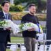 Japan’s Prime Minister Fumio Kishida (L) and Ukraine’s President Volodymyr Zelensky prepare to lay wreaths at the Cenotaph for the Victims of the Atomic Bomb at the Hiroshima Peace Memorial Park, following the G7 Summit Leaders’ Meeting in Hiroshima on May 21, 2023. (Photo by Handout / Ministry of Foreign Affairs of Japan / AFP) / —