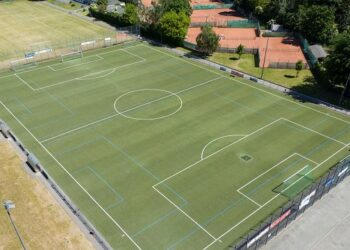 A photo taken on May 31, 2023 shows an aerial view of the football pitch of SV Viktoria Preussen in the Frankfurt district of Eckenheim, western Germany, where after a football tournament on May 28, a 15-year-old player from Berlin was seriously injured by a 16-year-old from France by blows to the head. - The 15-year-old Berlin teenager, very seriously injured by a player of the French club Metz during a fight after a match of an international tournament in Frankfurt, has died, German police said on May 31, 2023. (Photo by Boris Roessler / dpa / AFP) / Germany OUT / GERMANY OUT